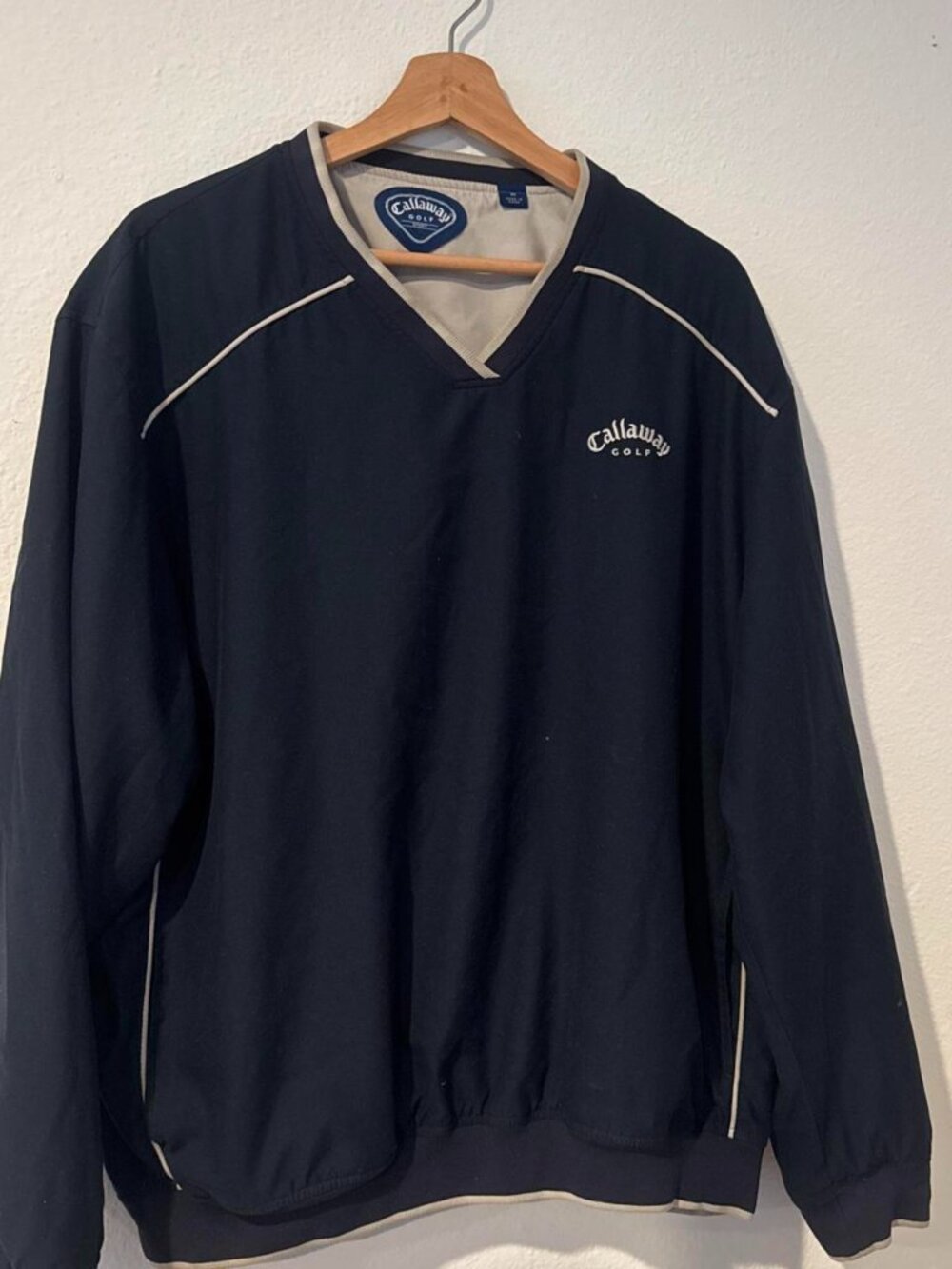 Callaway Golf navy blue pullover sweatshirt with white piping along the